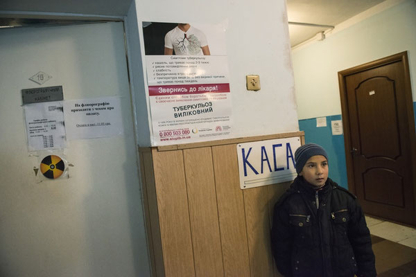 A child while waiting to be visited for internal contamination at the Ivankiv hospital. Ivankiv.