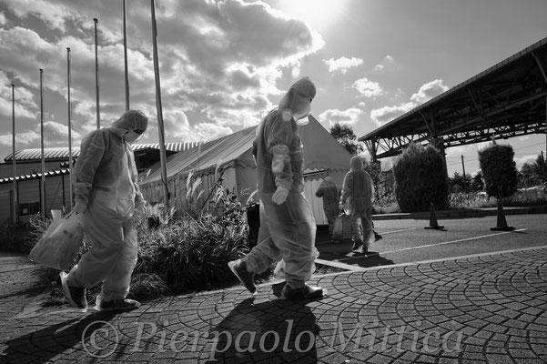 Workers coming back from their shift at the Fukushima nuclear power plant, J Village, Naraha.
