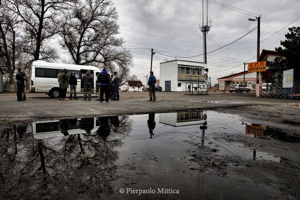 The van of tourists arrived at the check point of the 30 km exclusion zone, checking documents and permits