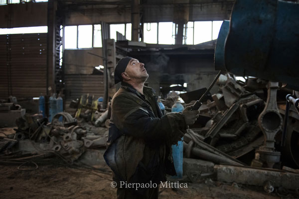 Pavel while loading the scrap metals on the truck