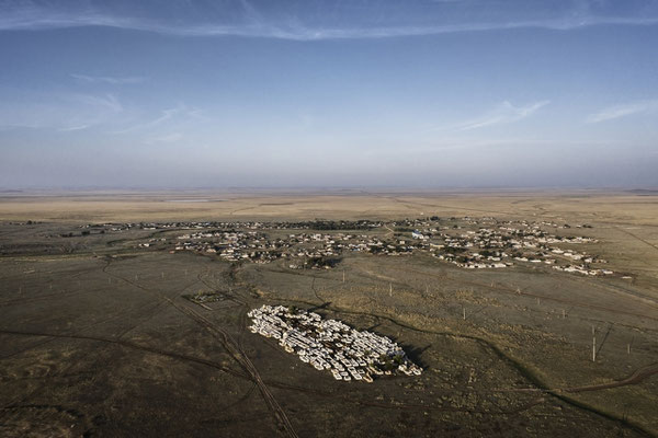 In the foreground the cemetery of the village of Znamenka. The cemetery is very large for a village of 2000 inhabitants. This is due to the high cancer mortality rate due to the polygon.