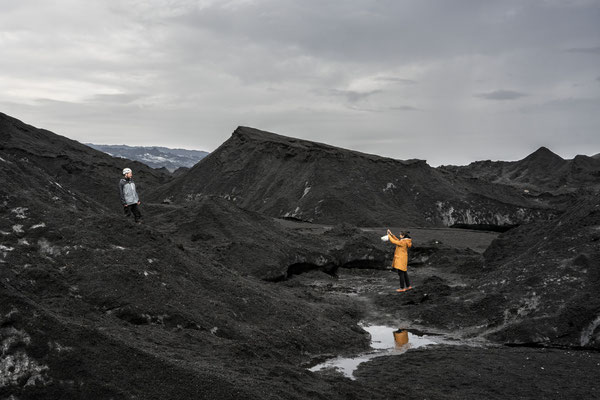 Iceland. Tourists take photos on a trip to the Katla Volcano.