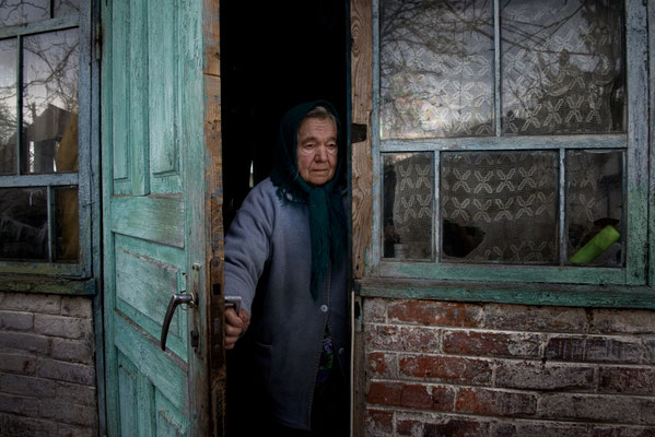 Maria Semenyuk, 78 years old, in her home waiting for her husband Ivan. On May, 17th 2016 Maria has died after living all her life in her home. She was buried in Paryshev cemetery. Paryshev, Chernobyl Exclusion Zone