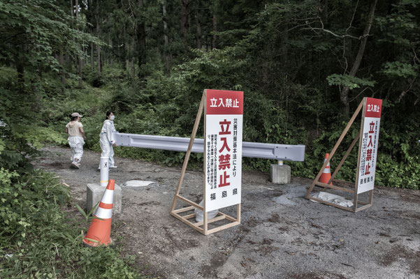 Animal activists while entering illegally in the Fukushima Exclusion Zone, Fukushima "No-Go Zone", Japan.