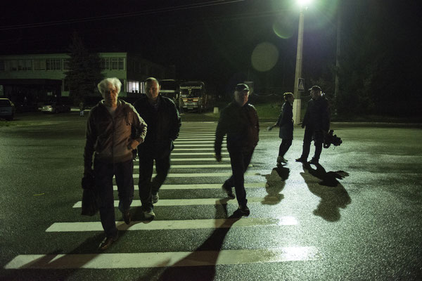 Chernobyl town. Workers return to their accomodation after their shift.