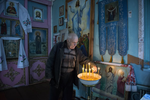 Viktor Petrovich Lukanjenko, 75 years old in the small orthodox church of the village of Marjanovka, Chernobyl Exclusion Zone