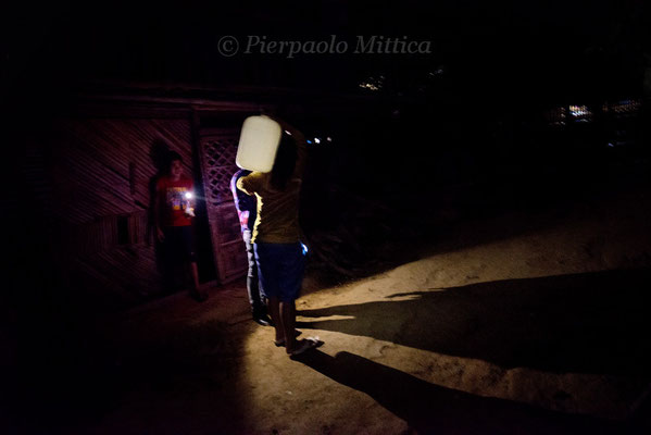 Going to the well to take water, Mae La refugee camp, Thailand