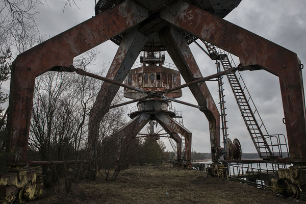 Abandoned cranes in the Chernobyl river port. Chernobyl Exclusion Zone.