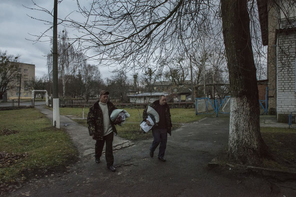 Chernobyl town. Workers return to their accomodation after their shift. Chernobyl Exclusion Zone.