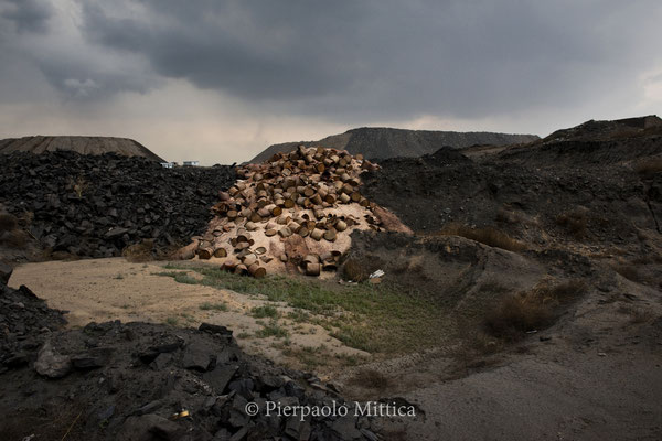 Barrels of toxic waste spilled into the environment