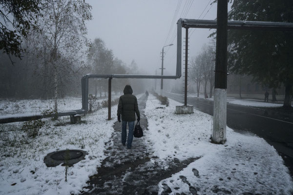 A worker going back home in Chernobyl town