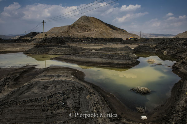 Toxic chemical liquids coming from the mines and spilled into the environment