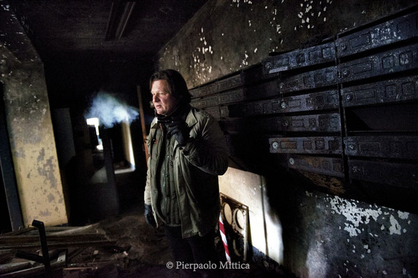 Yuriy Tatarchuck inside a building while waiting for tourists going around 