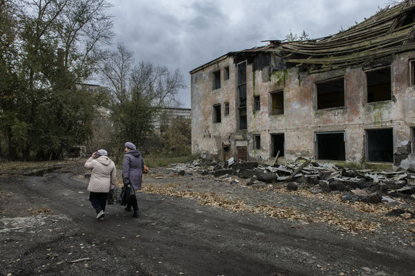 local inhabitants in the abandoned part of the city