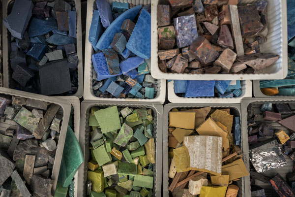 Spilimbergo (Pordenone, Italy), the Friuli School of Mosaic. Pieces of mosaic and glass ready to be used by the students to create mosaics.