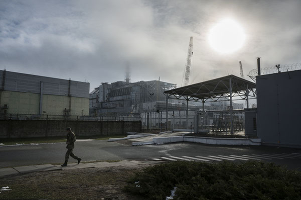 The Chernobyl plant with the old sarcophagus, two months prior to the installation of the new safe confinement