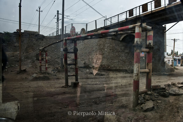 Mr An inside the restaurant along the road leading to the coal mines inside the semi evacuated town of Gongwusu