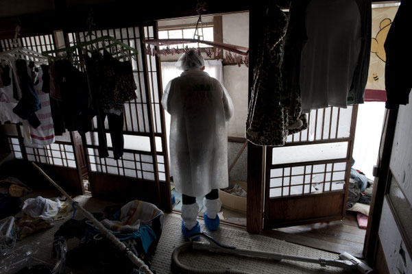 Residents going back home to collect their belongings, Tomioka city, Fukushima "No-Go Zone", Japan.