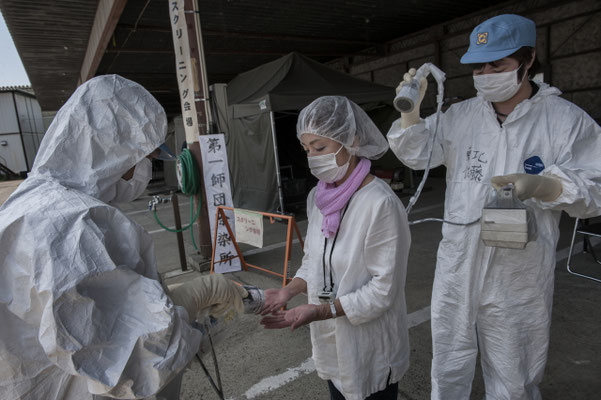 Once returned from the exclusion zone, residents are checked for contamination, Sousou Health Center, Minamisoma