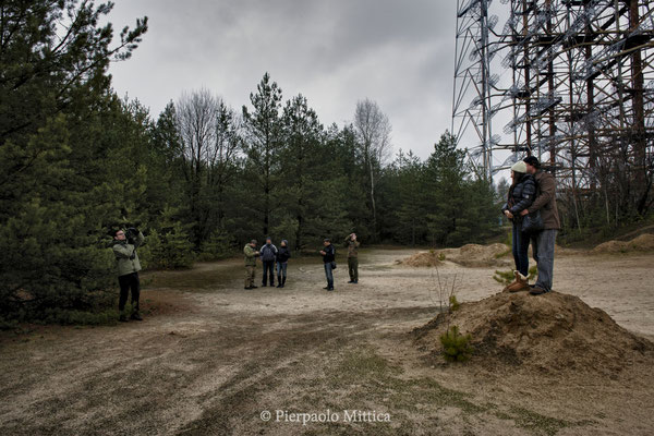 Jose with his wife while they make a souvenir photo in front of the military antenna Duga 3. They come from Argentina and are doing a tour of Ukraine and Poland. they have thought to include in the tour the visit to Chernobyl as definitely unusual