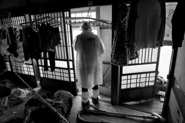 Residents going back home to collect their belongings, Tomioka city, Fukushima "No-Go Zone", Japan.