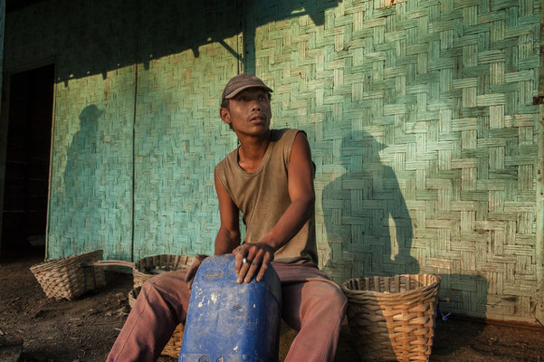  Supriyanto, 30, making a rhythm for a ballad song he created during a break time.  