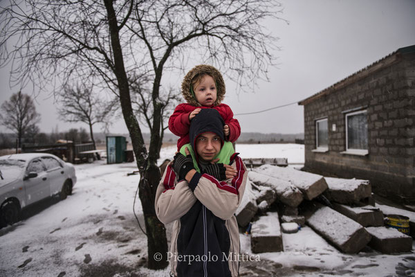 Valeri, 16 years old and her sister Victoria, 3 years old,are the sons of Victor the chief of the compound where the radioactive metals are recycled. they live in Kovalivka, a contaminated village situated 5 km from the Chernobyl exclusion zone