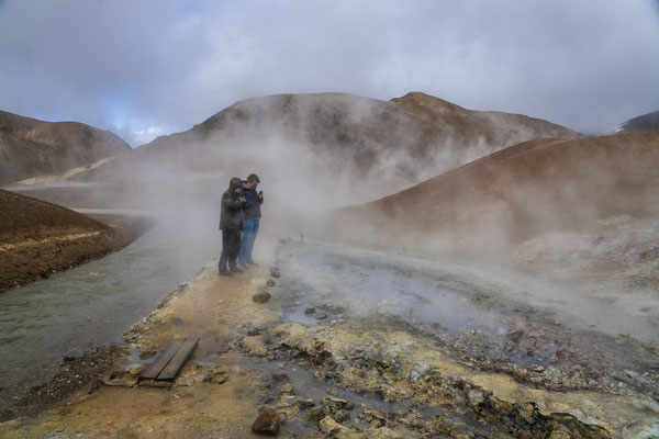 Iceland. Tourists visit the Hveradalir geothermal complex, a wonderland of geothermal vents, boiling mud pools and rainbow-coloured hot springs, located in Kerlingarfjöll, a mountain range in Iceland’s central highlands.