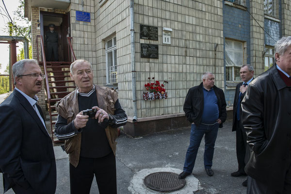 Former liquidators awaiting the delivery of medals in memory of the Chernobyl accident. Main square of the city of Chernobyl.