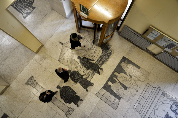 Italy. In the hall of the University of Trieste are situated mosaics created in 1942 by the Friuli School of Mosaic in Spilimbergo (near Pordenone) in collaboration with Trieste artist Ugo Carà.