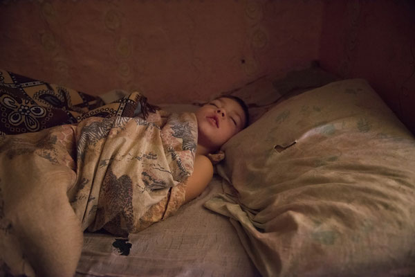 Vladik sleeping at his home in Radinka