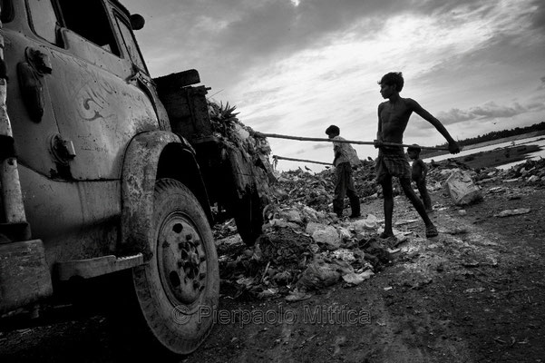 dumping garbage from truck, Aminbazar landfill dump, Dhaka