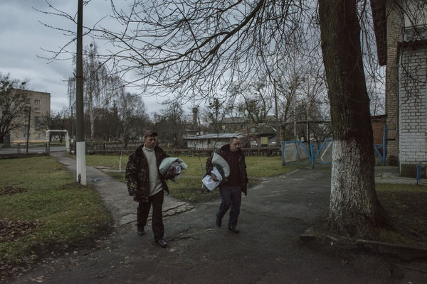 Chernobyl town. Workers return to their accomodation after their shift. Chernobyl Exclusion Zone.
