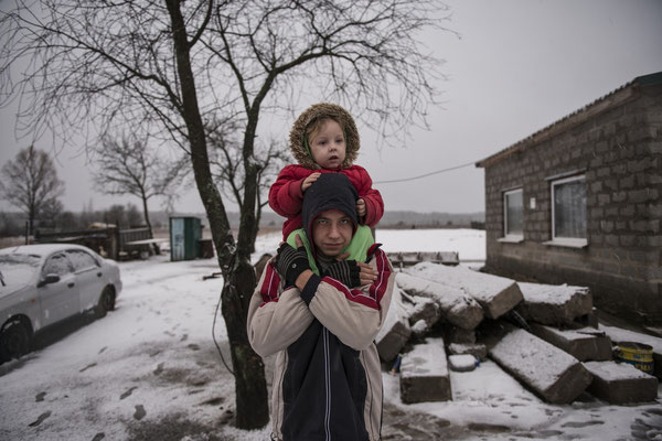 Valeri, 16 years old and her sister Victoria, 3 years old, live in Kovalivka, a contaminated village situated 5 km from the Chernobyl Exclusion Zone.