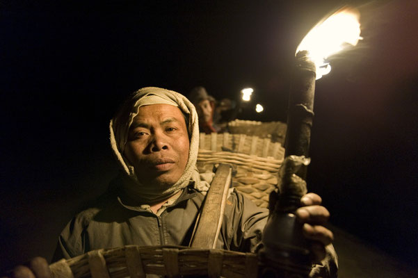 Yus, lives in Empal gading village, here he is during his night working shift