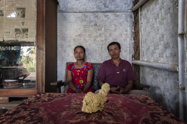 Saekoni with his wife at home, he lives in Kluncing village