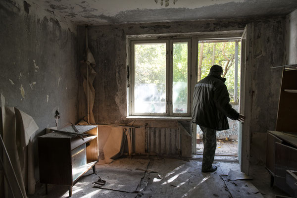 Valeri, a former resident of the city of Pripyat, visiting the apartment where he lived before the accident. City of Pripyat