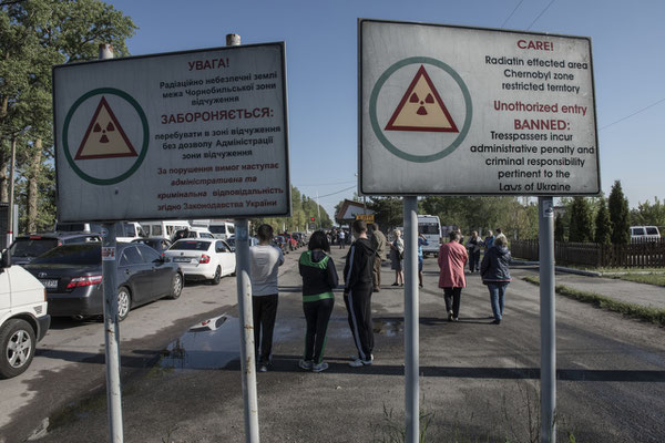 Former inhabitants waiting to enter the Chernobyl exclusion zone.