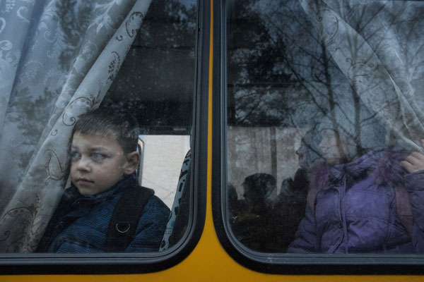 Igor going home from school with the school bus. Radinka