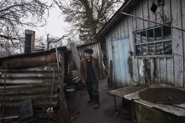 Ivan Ivanovich Semenyuk, 82, in his home, Paryshev, Chernobyl Exclusion Zone