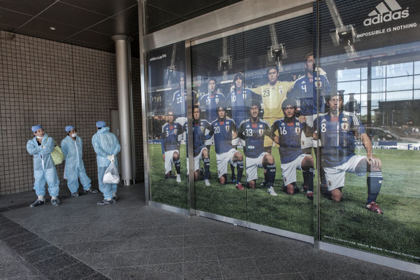 Workers preparing to go to work, J village, the Tepco headquarter, Fukushima "No-Go Zone", Japan.