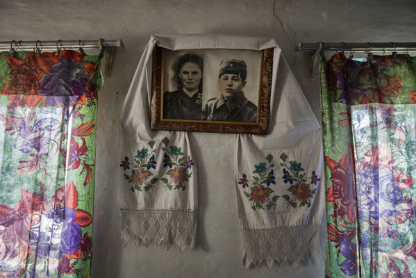 Portrait of Maria Shovkuta and her husband, when they were younger, Opachici village, Chernobyl Exclusion Zone