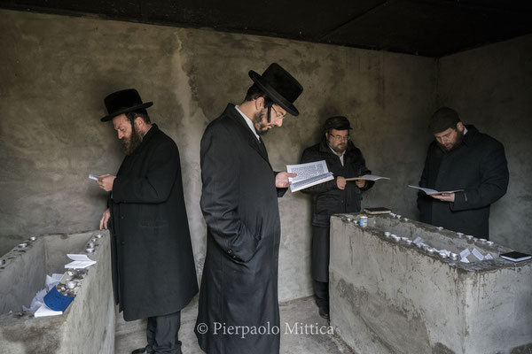 Jews while praying on the tombs of  Grand Rabbi Aharon Twersky Admur of Chernobyl and Grand Rabbi Menachem Nachum Twersky Admur of Chernobyl. 