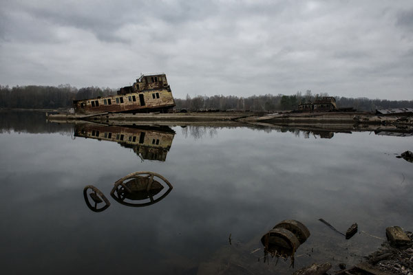 Sunk ships in the Chernobyl river port. Chernobyl Exclusion Zone.