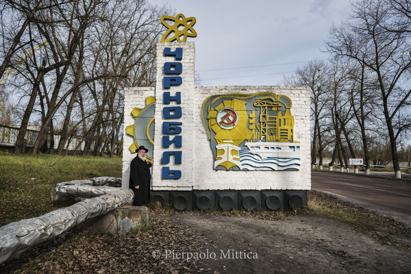 Yitz Twersky in front of the monument of Chernobyl entrance