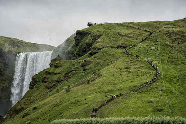 Iceland. The Skógafoss waterfall, situated in the south of the island in the locality of Skógar, is on the Skógaá River, which is fed by the Eyjafjallajökull glacier. Spanning 25 metres in width, it boasts a drop of 60 metres. A stairway of around 700 ste