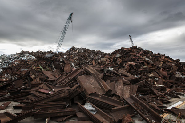 Tsunami debris collected in the Soma port.