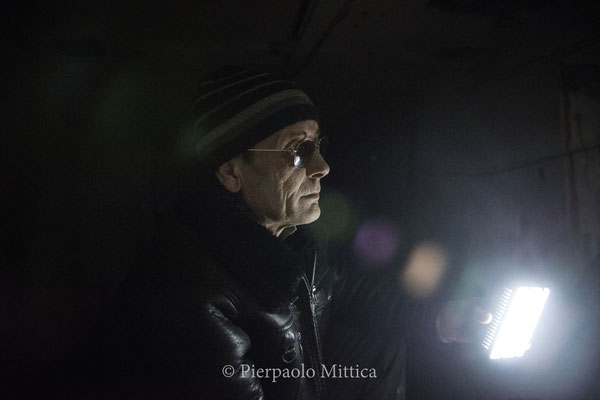 Victor inspecting Reactor Five to list the different metals to recycle.