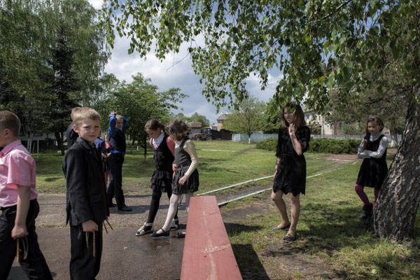 Children while playing in the school garden in the contaminated village of Radinka