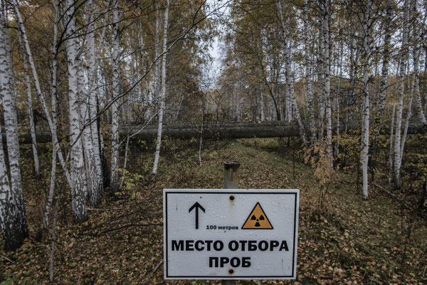The sign warns: detection point for the contamination. Road to Lake Karachay, Novogorny
